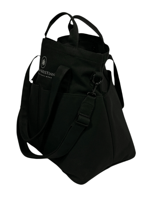 Black Organizer Black Raven, cotton tote bag inspired by Norway's mystical past, featuring black buckles and practical handles and straps.