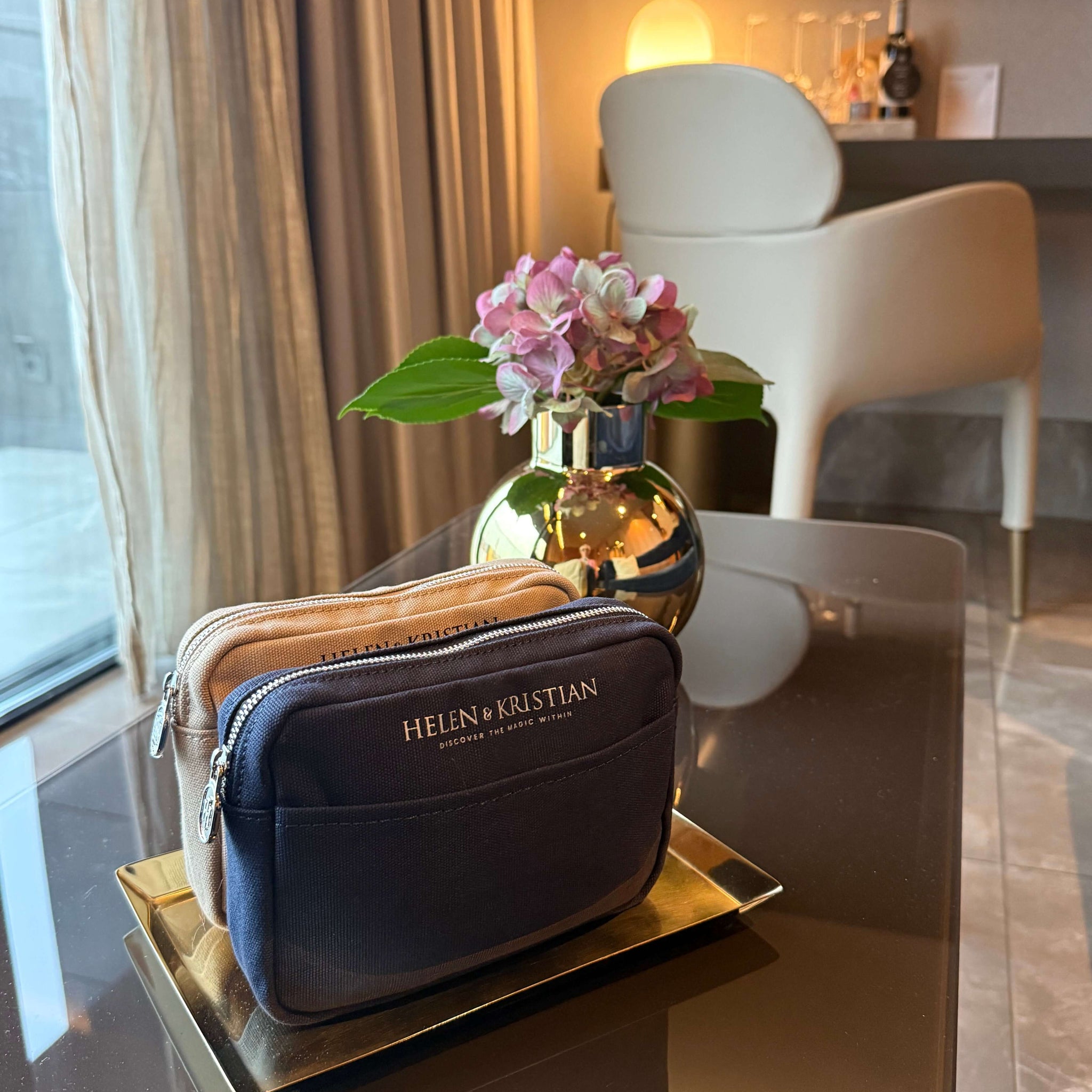 Nipsy - Clutch - Blueberry Mist displayed on a table with a stylish interior background.