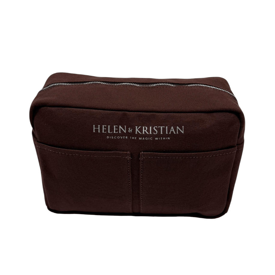 Brown cosmetic bag with 'Helen & Kristian' branding on a white background