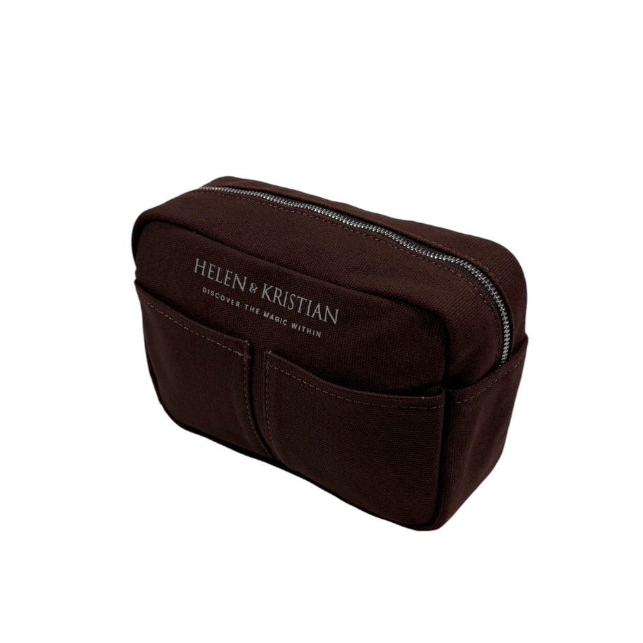 Brown cosmetic bag with 'Helen & Kristian' branding on a white background