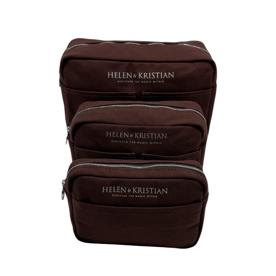 Set of three brown cosmetic bags with 'Helen & Kristian' branding on a white background