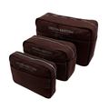 Set of three brown pouches with zippers, perfect for organization, showcasing the elegant Nipsy Roasted Chestnut Clutch.