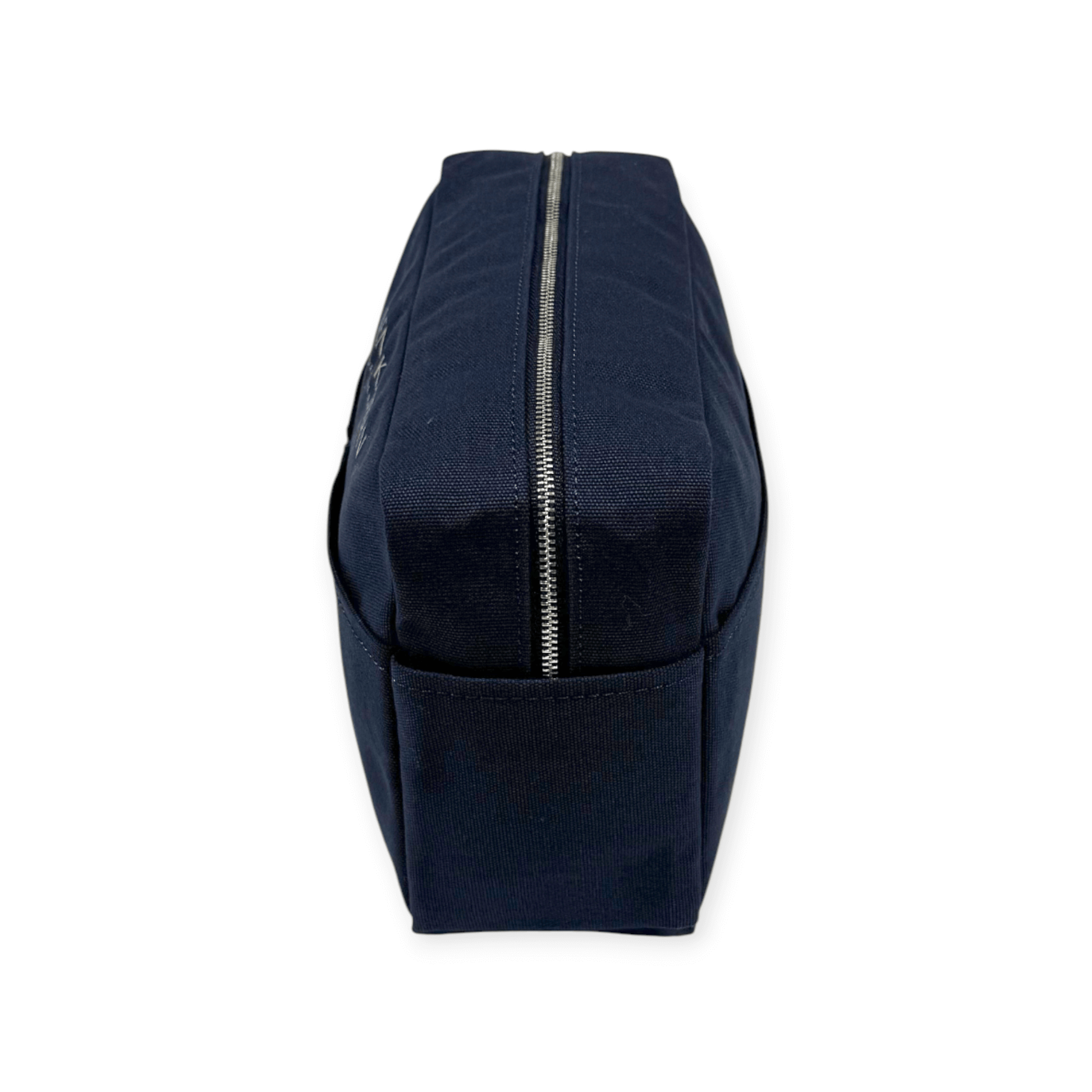 Side view of Nesty Blueberry Mist Large Toiletry Bag by Helen & Kristian, showcasing sleek Scandinavian design and zip closure.