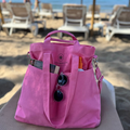 Pink Arctic Rose organizer bag with Helen & Kristian logo, perfect for the Beach