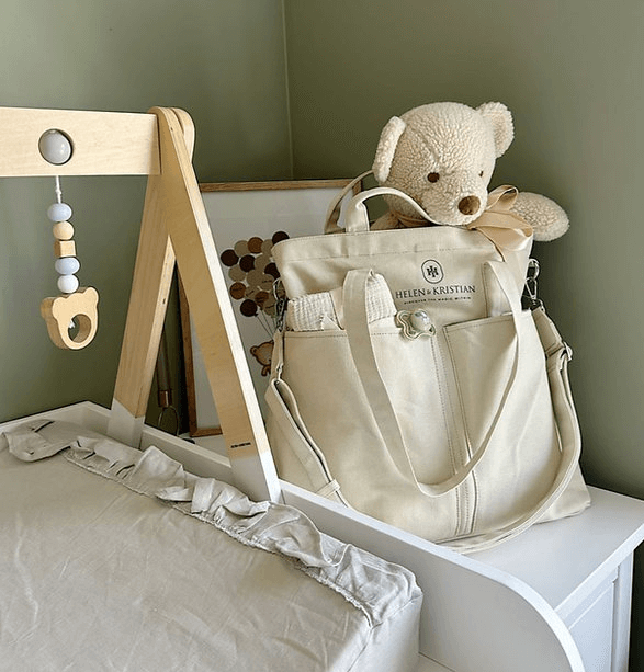 Organizer Frost Whisper bag with multiple pockets, showcasing soft muted tones inspired by mystical Norwegian peatlands.